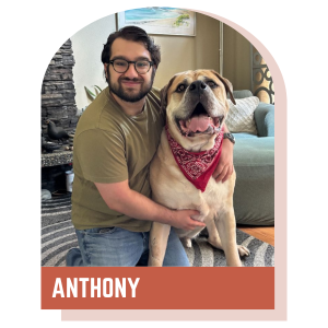Odin the dog and Anthony, a Veterinary Technician at Lynnwood Animal Hospital